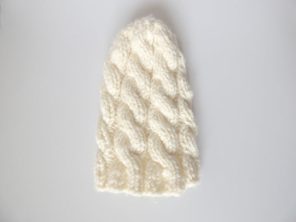 Knitted hat - snowy white with cables