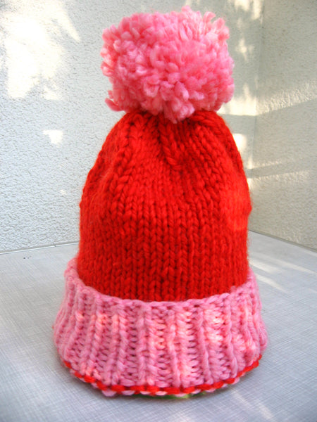 Knitted hat - big pompom red and pink